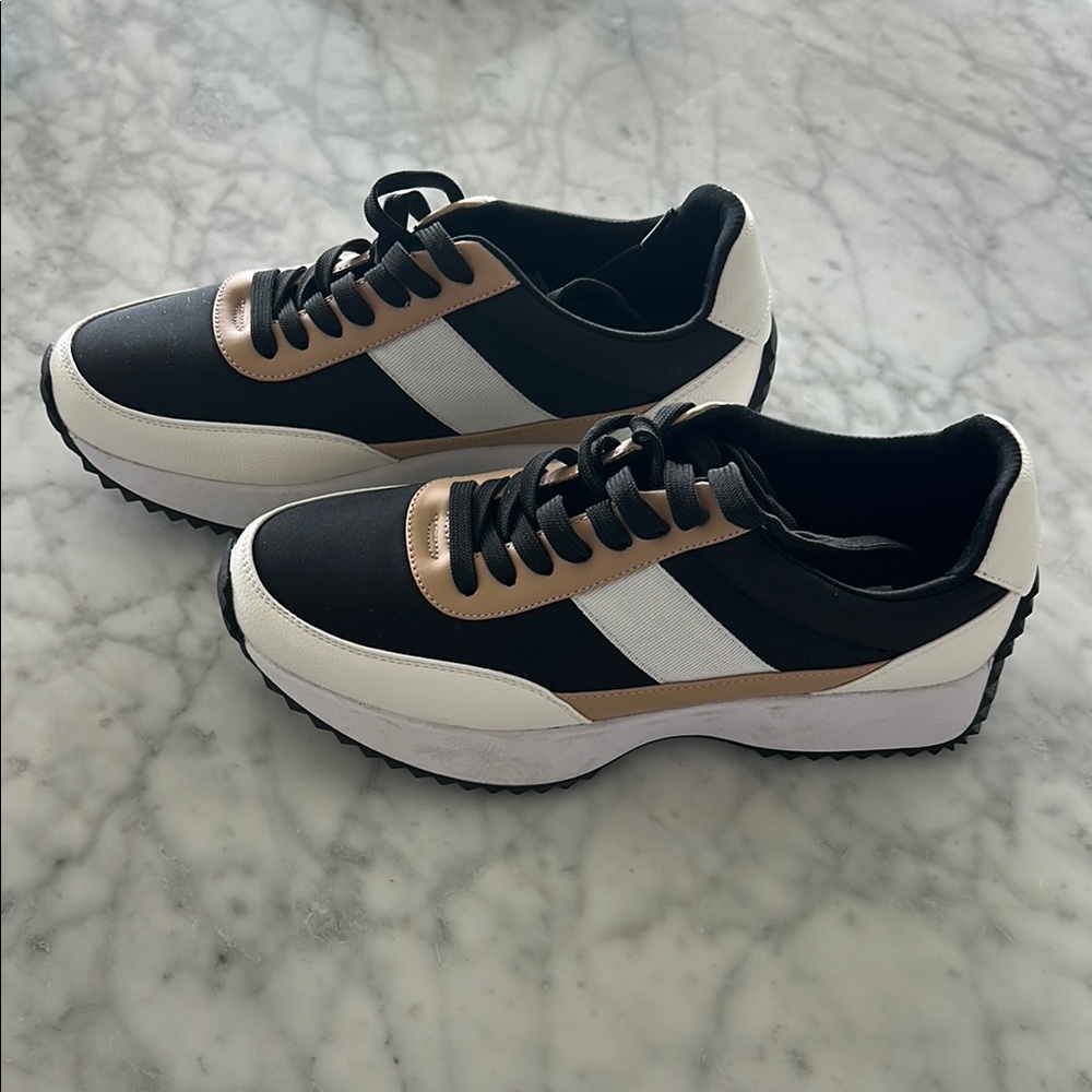 Women’s dolce vita size 9.5. Stylish Black and White Women's Sneakers